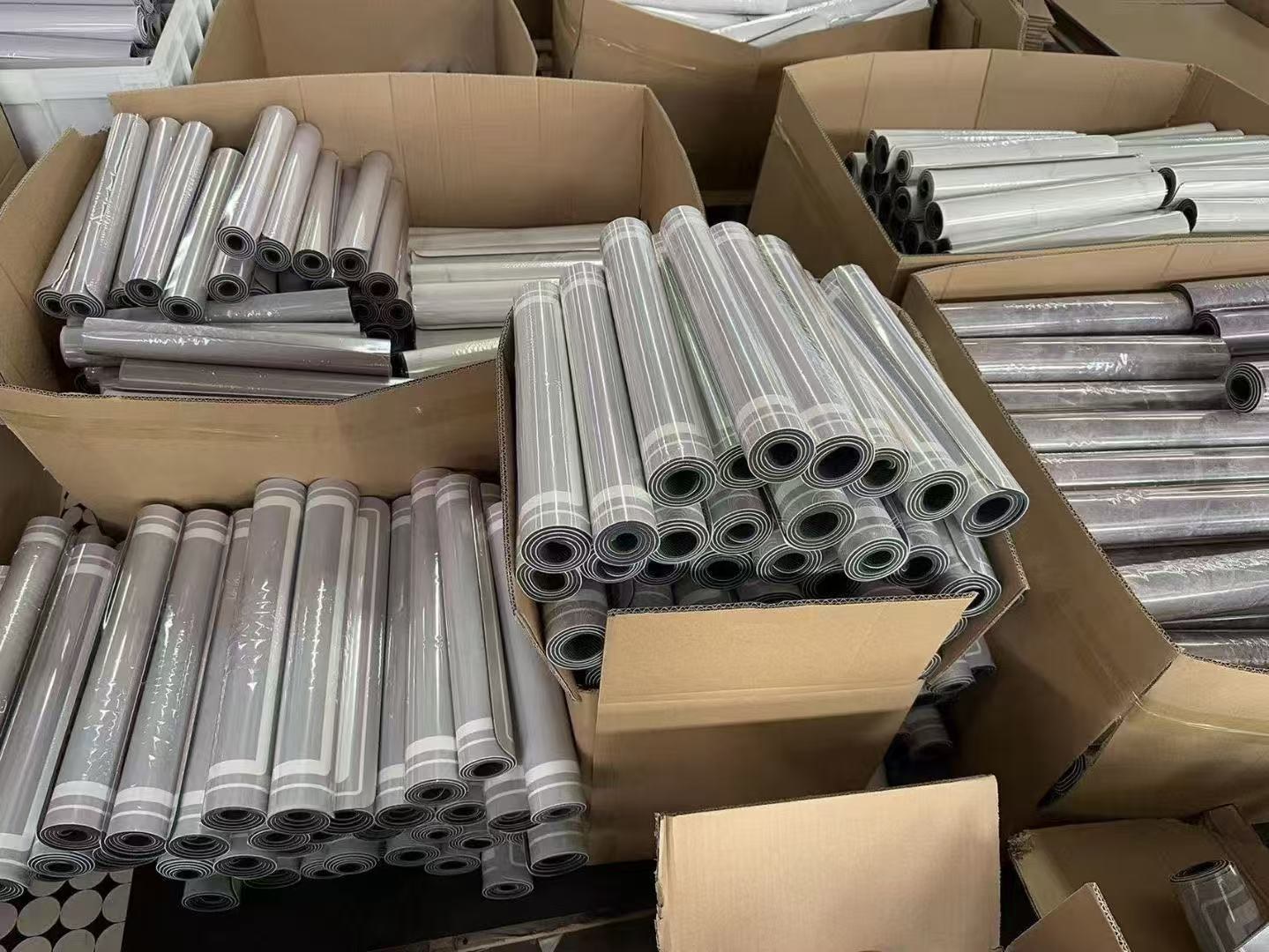 Finished soft mats prepared and rolled for packing